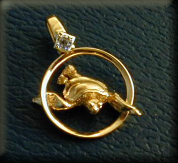 14k yellow gold swimming turtle  pendant with diamond accent